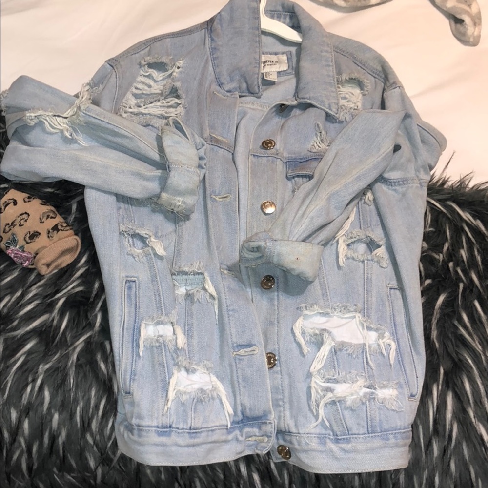 Distressed jeans jacket